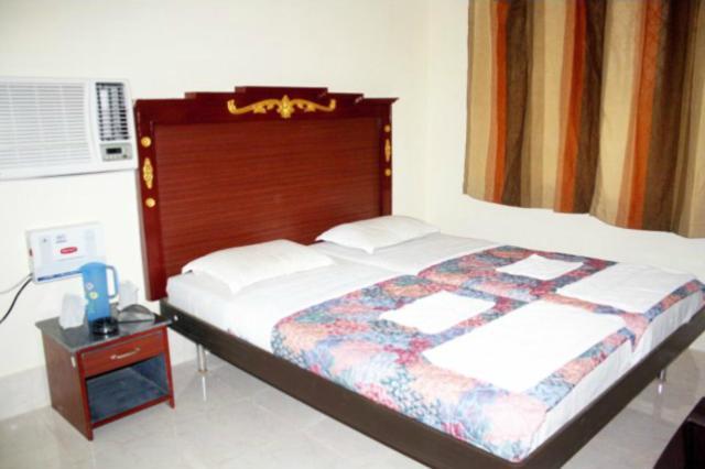 Hotel Maa Kamakhya Пури Стая снимка