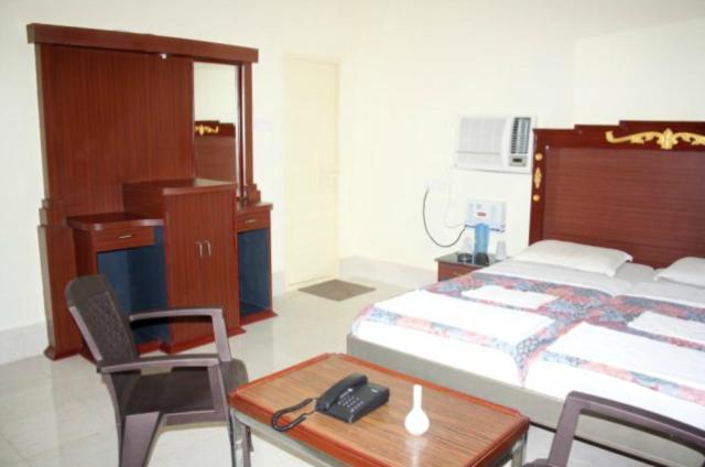 Hotel Maa Kamakhya Пури Стая снимка