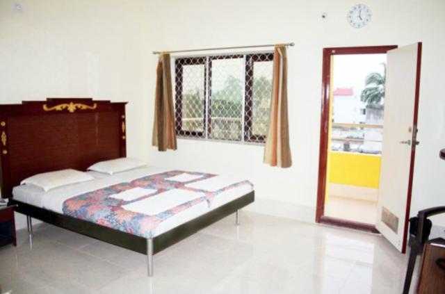 Hotel Maa Kamakhya Пури Стая снимка